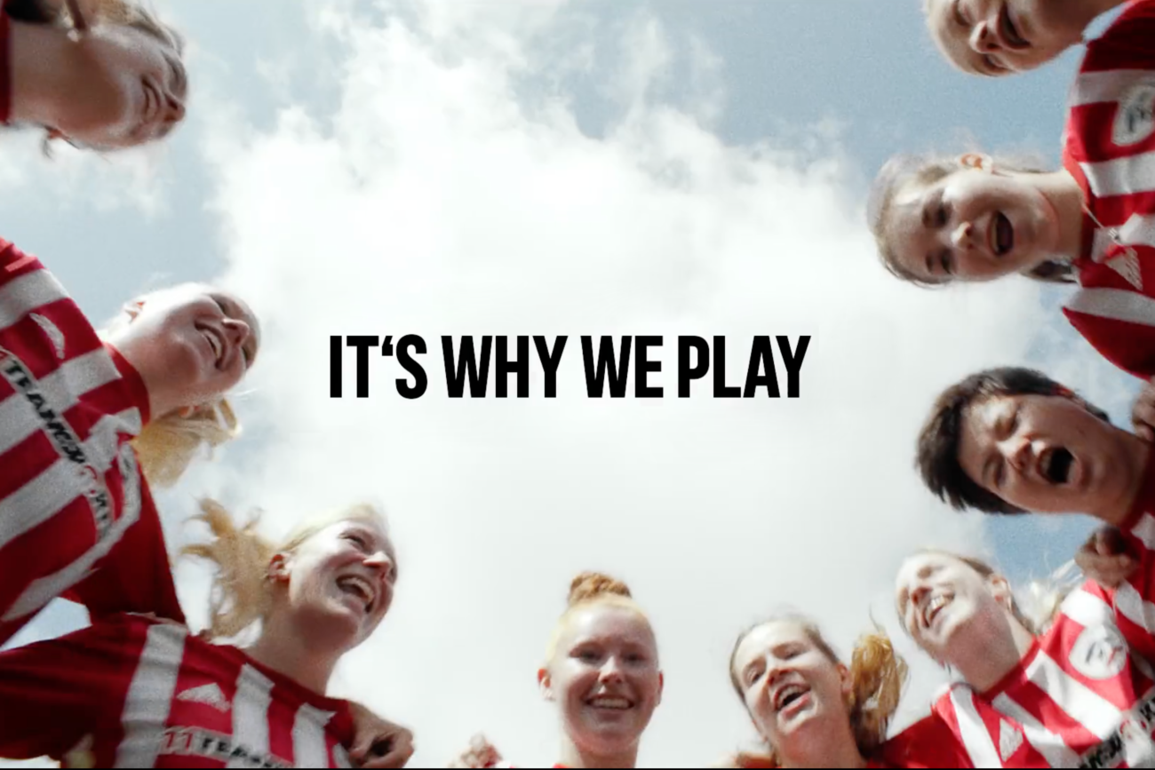 Amateur football players warming up on a pitch in Berlin for Adidas Back to Club campaign