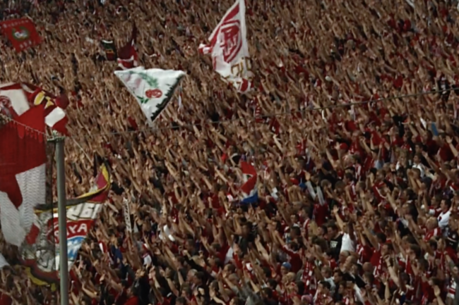 Archive video frame of FC Bayern Munich match moment used in Markenfilm